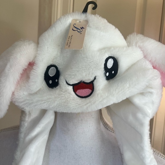 Bunny hat, new with tags super cute when you press the pause the ears go up - Picture 3 of 13